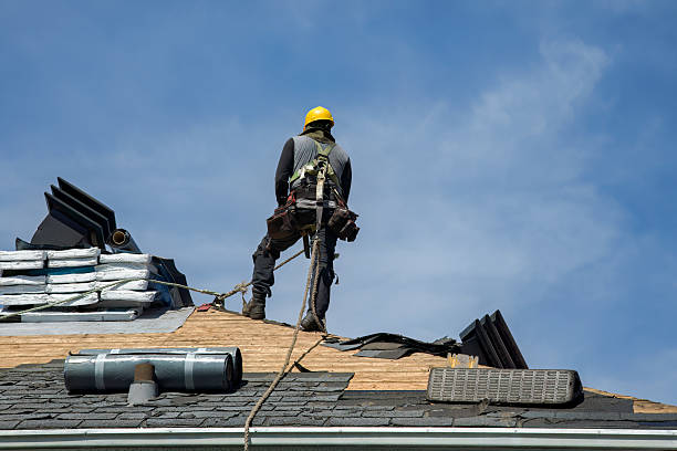 Professional Roof Replacement technician working in Paxton, MA